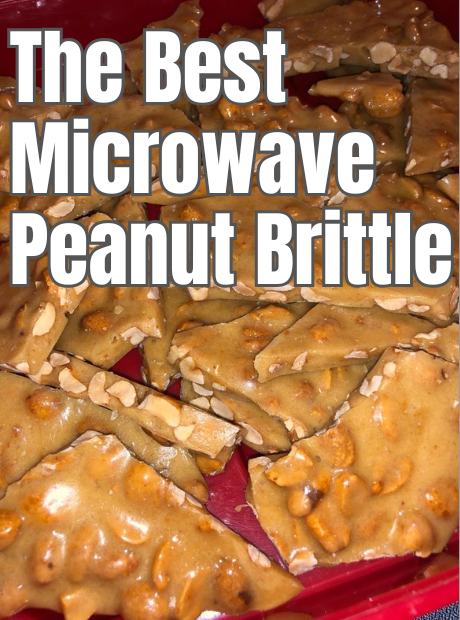 A batch of golden, crunchy Microwave Peanut Brittle broken into pieces, showing its light, airy texture and roasted peanuts, served on a white parchment-lined tray.