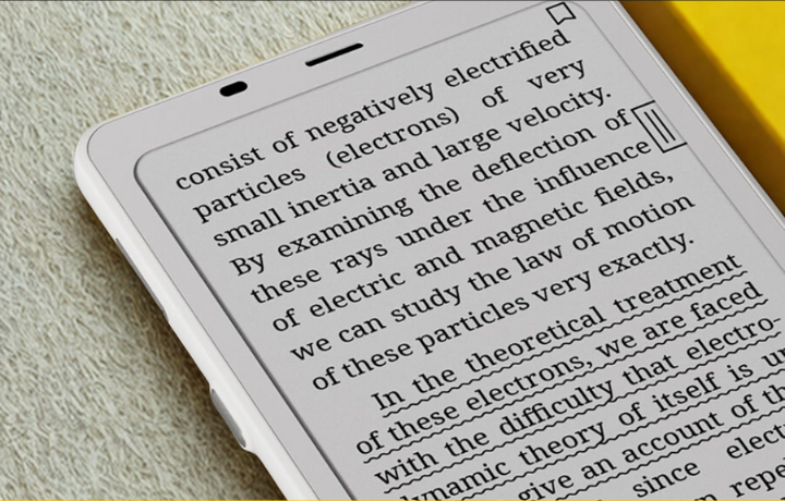 Boox Palma 2 running Kindle app in dark mode with text and smooth scrolling